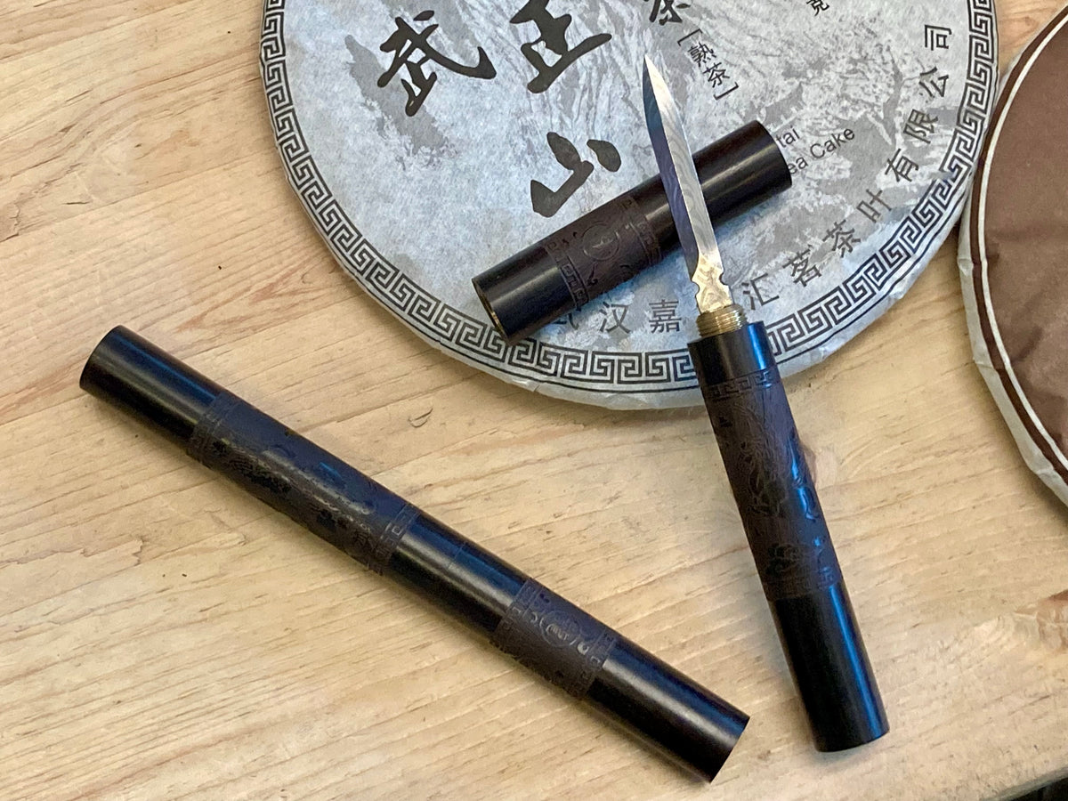 Yi Wu Mountain Pu Erh Beeng Cha - Shu
