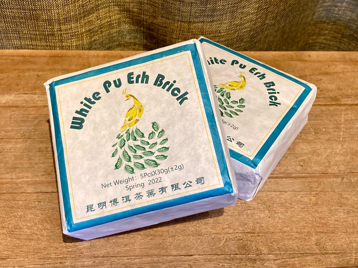 White Puh Ehr Brick Peacock