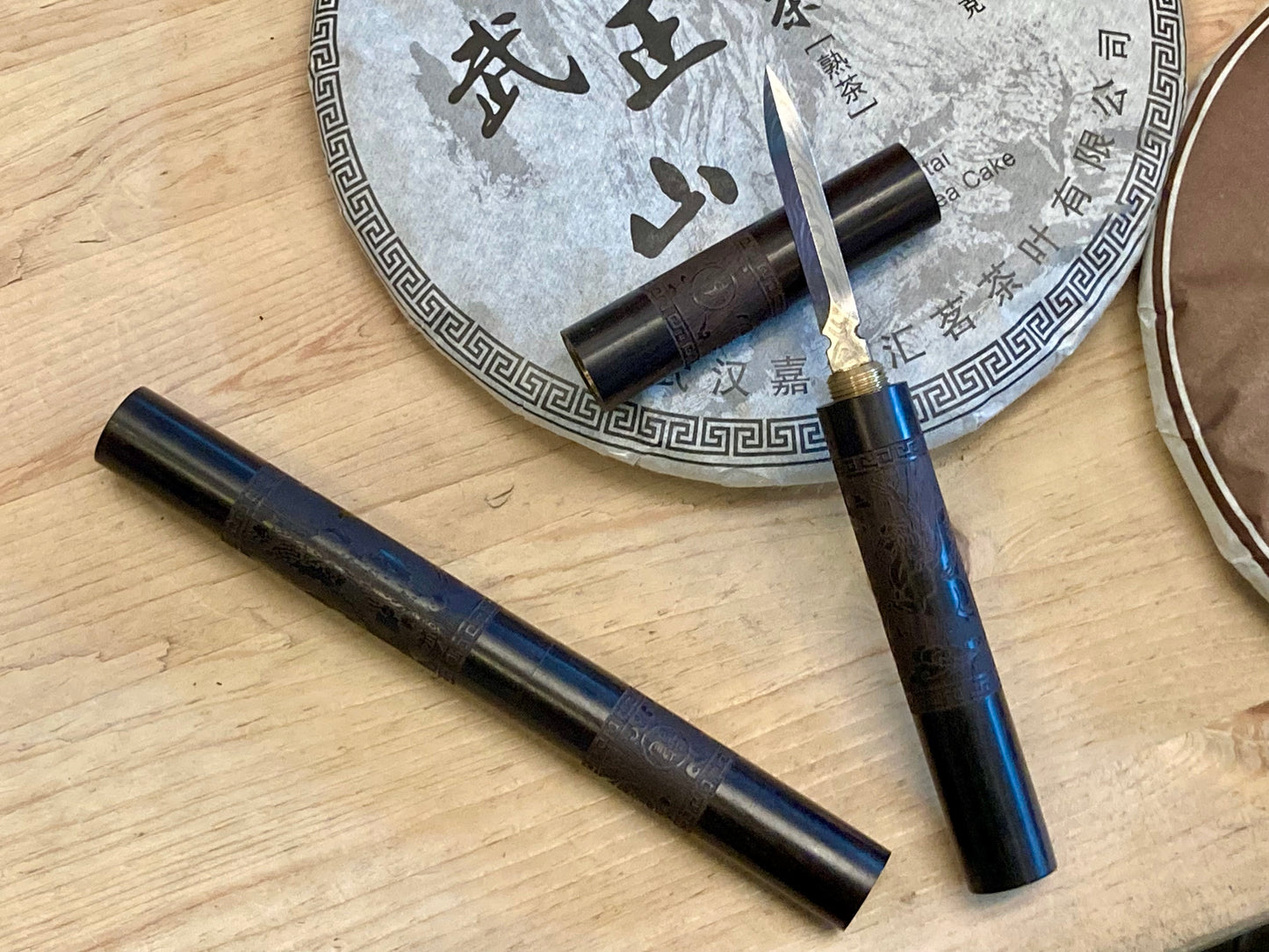 Yi Wu Mountain Pu Erh Beeng Cha - Shu